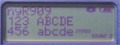 LCD during titling operations, showing part of the character palette